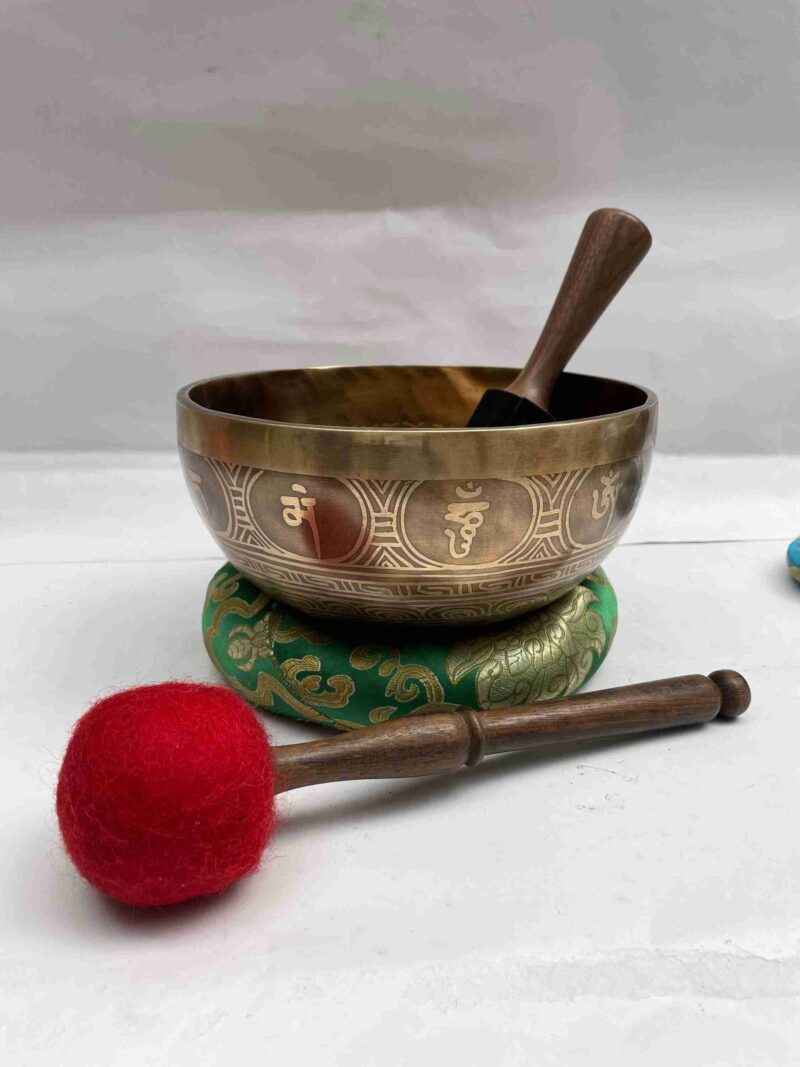 Buddhist Hand-Beaten Jambati Singing Bowl – Buddha Eye Design, Intricate Carving - Image 3