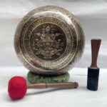 Buddhist Hand-Beaten Jambati Singing Bowl with Aparimita Design & Carving - Image 2