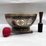 Buddhist Hand-Beaten Jambati Singing Bowl with Aparimita Design & Carving - Image 3