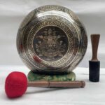 Buddhist Hand-Beaten Jambati Singing Bowl with Yoga Design & Carving - Image 4