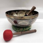 Buddhist Hand-Beaten Jambati Singing Bowl with Yoga Design & Carving - Image 2